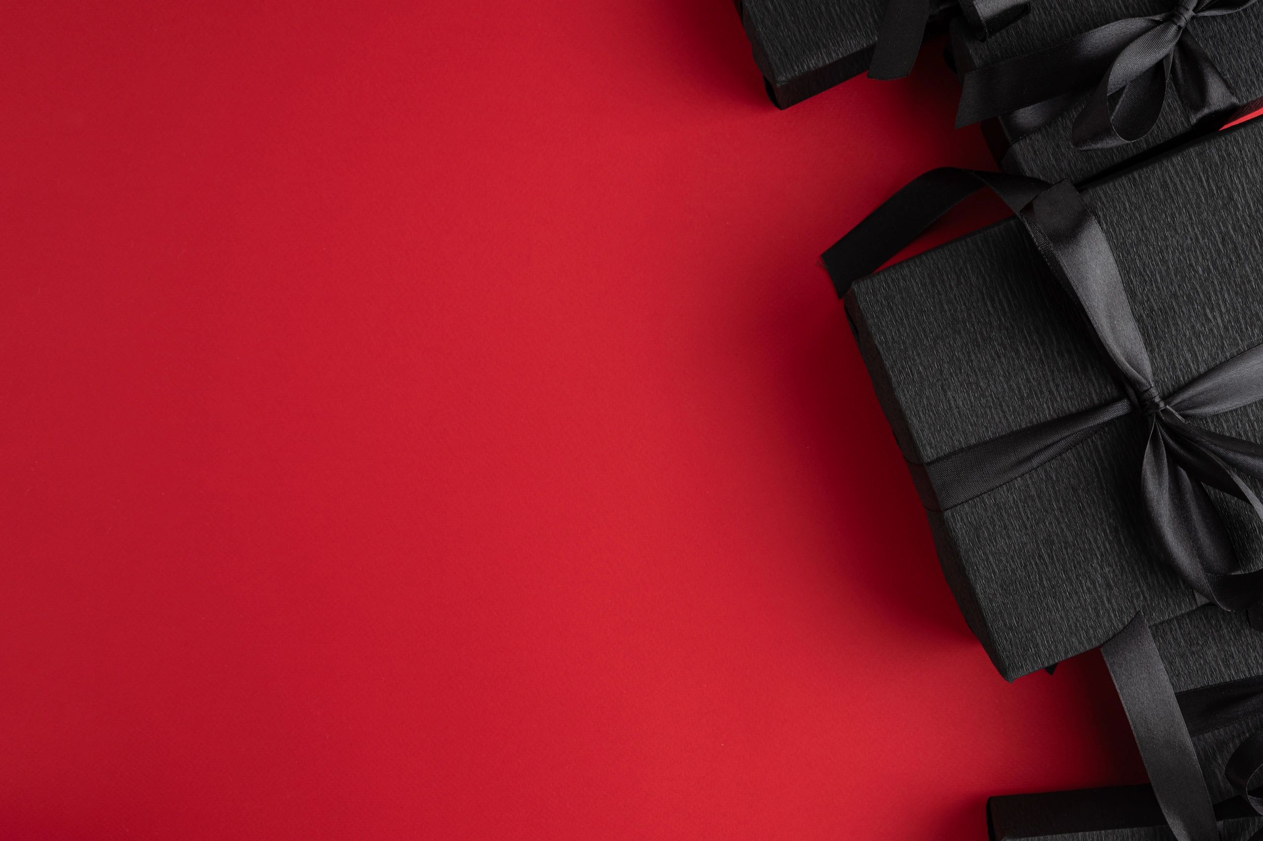 Luxury black gift boxes representing future rewards